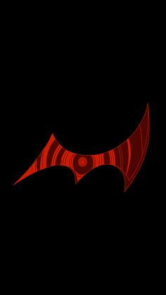 a red bat on a black background with the word'batman'in front of it