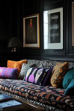 a living room filled with lots of colorful pillows