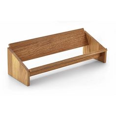 a wooden bench sitting on top of a white floor