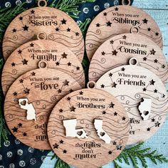 four wooden christmas ornaments with the words when you are siblings, then you are friends