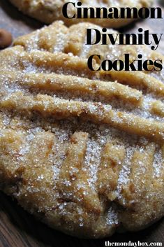 some cookies are covered in powdered sugar and have the words cinnamon divinity cookies on them