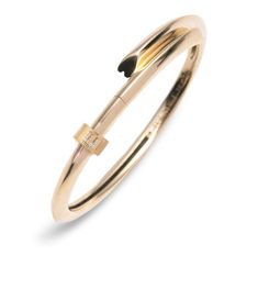 Description Handcrafted in 18 karat Yellow Gold, this Strong Heart bangle symbolizes love. Love is what makes our heart beat. From the same concept as our Strong Hearts Chain, each bangle is drawn from a heart, ending and beginning with love, yet the heart is still discrete. Complimented with pave diamonds and, this Strong Heart Bangle Story paired with a Pave Diamond Initial Heart Beat. Choose the letter or number that speaks to you the loudest.The opening of each Heart Beat has a heart silhoue Elegant Gold Heart-shaped Bangle, Valentine's Day Yellow Gold Bangle Bracelets, Valentine's Day Yellow Gold Bangle, Luxury Yellow Gold Heart-shaped Bracelet, Heart-shaped Yellow Gold Formal Bracelets, Polished Bangle Bracelet For Promise Occasion, Heart-shaped Yellow Gold Bracelets For Formal Occasions, Formal Heart-shaped Yellow Gold Bracelets, Formal Yellow Gold Heart Bracelets