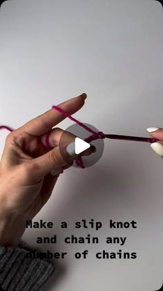 a woman is knitting with pink yarn and saying make a slip knot and chain any number of chains