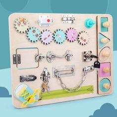 a wooden board with various items on it including scissors, keys and other things that are attached to the board