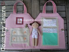 a pink bag with a doll on it