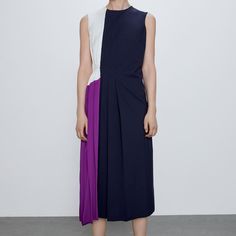 Round Neck Sleeveless Dress. Buckled Tie At Side Waist. Back Hidden In-Seam Zip Closure. Outer Shell Main Fabric 100% Viscose Secondary Fabric 69% Polyester, 29% Viscose, 2% Elastane Price Firm. Thanks Chic Blue Patchwork Midi Dress, Purple Sleeveless Midi Dress For Spring, Sleeveless Purple Patchwork Dress, Purple Patchwork Sleeveless Dress, Purple Patchwork Summer Dress, Purple A-line Dress For Workwear, Blue Color Block Dress For Work, Purple Color Block Dress For Spring, Spring Purple Color Block Dress