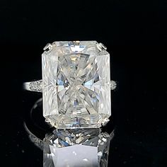 an engagement ring with a large diamond in the center