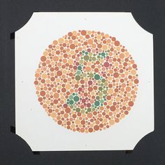 an image of a circle made out of circles on white paper with black border around it