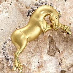 From our Couture Collection this beautiful solid 18k gold Cheval Stallion Horse Pin is hand made and hand finished with exquisite detail by an old world European master. It is truly a stunning work of art. Shown in 18k gold with .31ct diamond mane and tail. 2"H x 1 1/2"W. Old World European, Stallion Horse, Horse Collection, Stallion Horses, Shine Jewelry, Horseshoe Necklace, Equestrian Jewelry, Gold Horse, Horse Necklace