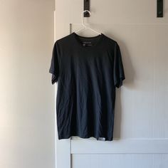 Walk In Love. Black T-Shirt Brand New Without Tags! Unisex Fit Size M Material: 50% Poly 50% Cotton Black Graphic Print T-shirt For Everyday, Black Relaxed Fit Basic Top, Basic Black Crew Neck Tops, Simple Black Cotton T-shirt, Black Relaxed Fit Simple Top, Black Graphic Tee Short Sleeve T-shirt, Black Graphic Tee For Everyday Wear, Black Graphic Tee For Everyday, Black Relaxed Fit Graphic Tee Shirt