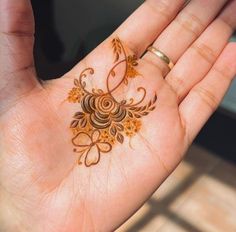 a person's hand with a hendi design on it