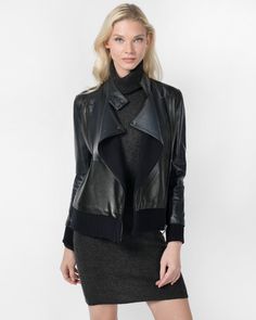 Elevate your style with our leather moto jacket, where modern meets timeless. Featuring color-blocked leather, bonded cashmere paneling, and an edgy asymmetrical zipper closure, this jacket is a bold fashion statement. Inside, you'll discover the cozy comfort of shaker-stitched cashmere, adding warmth and luxury to your look. Leather with Wool/ Cashmere trim Style #QW33816 Casual Leather Jacket, Gloves Fashion, Black Leather Coat, Brown Leather Jacket, Leather Jacket Black, Leather Moto, Leather Moto Jacket, Fall 2018, Leather Jackets Women