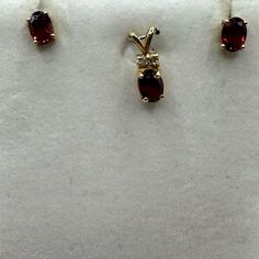 Lovely Garnet Set In 14k Yellow Gold. Pendant Set With 2 Diamonds Above. Gold Pendant Set, Garnet Pendant, Earrings Color, Pendant Set, Matching Earrings, Gold Pendant, Lady In Red, Garnet, Diamonds