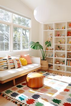 a living room filled with lots of furniture and bookshelves next to a window