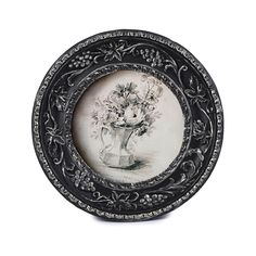 a black and white plate with flowers on it