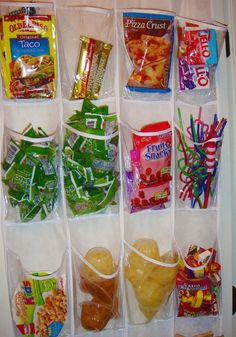 an organized pantry drawer filled with snacks and candy bar wrappers, labeled 7 a shoe organizer is perfect for the pantry