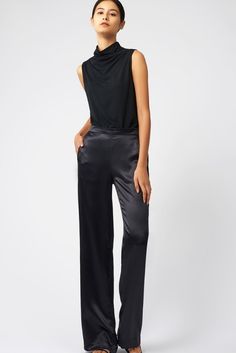 A must have in every women's wardrobe is our Classic Silk Trouser.  Featuring a flat front waistband and elastic back, side slant pockets, and the perfect leg opening, this style fits with ease and can be worn your favorite sweater for a luxe look this Holiday. 100% Silk MADE IN NYC | #kalrieman Elegant Wide Leg Pants With Pull-on Style For Fall, Chic Formal Pull-on Bottoms, Elegant Viscose Tapered Leg Bottoms, Elegant Tapered Leg Viscose Bottoms, Fall Workwear Viscose Wide Leg Pants, Fall Viscose Wide Leg Work Pants, Fall Wide Leg Viscose Pants For Work, Elegant Viscose Business Casual Bottoms, Elegant Viscose Bottoms For Business Casual