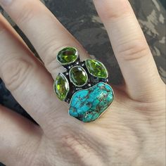 Brand New Handmade Rough Semi-Polished Turquoise And Peridot Silver Ring. 925 Stamped New To Poshmark? Use Referral Code Kimberlyn222 To Receive $10. Bohemian Green Rings With Gemstone Accents, Sterling Silver Turquoise Ring With Stones, Turquoise Multi-stone Gemstones In Sterling Silver, Artisan Green Turquoise Sterling Silver Ring, Green Multi-stone Gemstones For Jewelry Making, Green Natural Stone Ring Jewelry, Green Ring With Natural Stones, Green Natural Stone Ring, Green Peridot Bohemian Jewelry