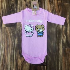 Adorable Pink Long Sleeve Onesies From Hello Kitty. Have Different Sizes. Brand New With Tags. Hello Kitty Onesie, Hello Kitty Logo, Knit Onesie, One Piece Hoodie, Hello Kitty Baby, Kitty Baby, Hello Kitty Characters, Hello Kitty Pink, Pink Hello Kitty