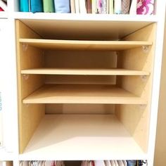 the shelves are filled with different types of fabrics