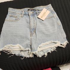 * Petite Extreme Rip High Waisted Denim Shorts * No Stains, Marks Or Holes * Nwt * Non Stretch High Waist Denim Shorts, Summer Denim Cutoff Pants, Summer Cutoff Denim Pants, Light Wash Denim Pants With Short Length, Ripped High Waist Medium Wash Bottoms, High Rise Ripped Light Wash Bottoms, Ripped High Rise Light Wash Bottoms, Mid-rise Ripped Blue Jean Shorts, Mid-rise Ripped Denim Shorts