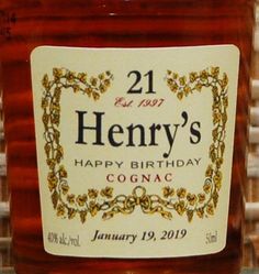 a jar of henry's happy birthday cognac honey sits on a shelf