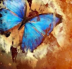 a blue butterfly is flying in the air