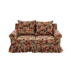 a floral couch with ruffles on the arms and back, sitting against a white background