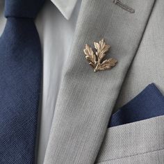 Gold plated leaf suit lapel pin to jazz up your outfit. Dimension:  approx. 1 inch by 1 inch Kids Easter Outfits, Suit Brooch, Lapel Pins Suit, Men's Brooch, Suit Pin, Wedding Outfit Men, Lapel Pins Mens, Bowtie And Suspenders, Dapper Gentleman