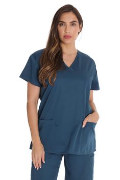 PRICES MAY VARY. MOVE WITH FREEDOM: Make those long shifts more bearable with enhanced comfort. We’ve designed our new nursing scrub tops using a blend of 93% polyester and 7% spandex; stretchy fabric that feels soft and moves with you. So, no more restrictions as you work. MATCH YOUR PRACTICE: Whatever the color of your uniform, there is a Just Love stretch scrub shirt to match. These V-neck nursing tops are available in over 18 solid colors and have a stylish mock wrap design. Make it a comple Scrub Shirt, Nursing Shirt, Safety Clothing, Scrubs Nursing, Neck Stretches, Nursing Tops, Medical Scrubs, Top For Women, Scrub Pants