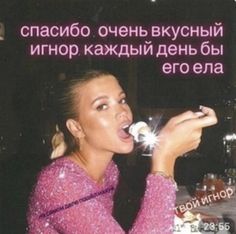 a woman is blowing out sparklers in her mouth