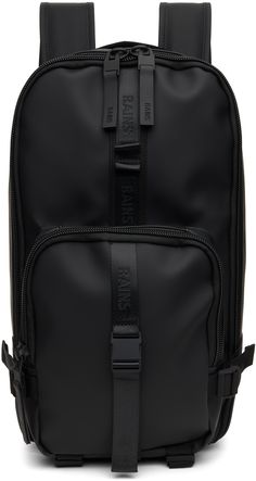 Waterproof polyurethane-coated canvas backpack in black. · Logo-woven webbing trim throughout · Webbing carry handle · Adjustable padded shoulder straps · Press-release sternum strap · Zip pocket at face · Cinch strap at sides and base · Padded mesh back panel · Two-way zip closure · Zip pocket at interior · Laptop compartment at interior · Canvas lining · H18 x W10.5 x D4 / 13.6L Supplier color: Black Trail Backpack, Rain Outfit, Mens Bags Fashion, Handbag Essentials, Briefcase For Men, Bags Fashion, Canvas Backpack, Press Release, Black Logo