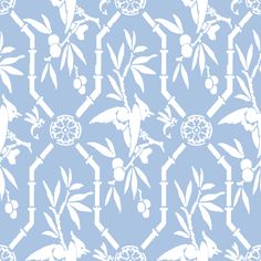 a blue and white wallpaper with birds on it