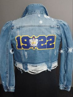 New Greek Sorority Distressed Denim Jean Jacket Women's Sorority Denim Jean Jacket Front pockets Sorority Emblems Made to order items Dry Clean Size : SMALL TO LARGE These are custom made to order...no refunds or cancelation once payment is submitted. These are final sale. Dry Clean only. SHIPPING INFORMATION: Item will ship via USPS via Priority mail with a tracking number that will be provided upon shipment. Most Items paid and cleared before 11:am Pst will ship out the same day or the next da Demin Jacket, Alpha Kappa Alpha Sorority, Greek Sorority, Delta Sigma Theta, Jean Jacket Women, Distressed Denim Jacket