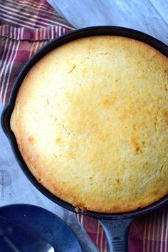 a cake in a cast iron skillet on a table