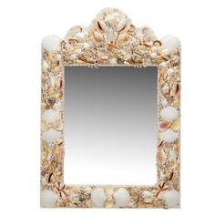 a mirror that has shells on it