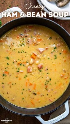 ham and bean soup in a pan with spoons on the side next to it