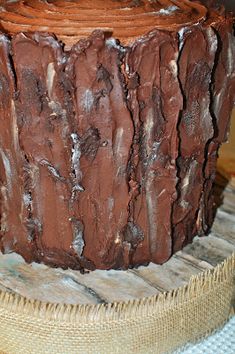 a chocolate cake sitting on top of a wooden table