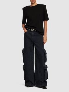 Find AMIRI Mid Rise Wide Denim Cargo Jeans on Editorialist. Front button and concealed zip closure. Belt loops. Intentionally faded areas may vary. Five pockets. Six leg cargo pockets. Model is wearing a size26 Denim Cargo Jeans, Denim Cargo, Cargo Jeans, Mid Rise, Black Jeans, How To Wear, Black