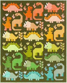 a quilted wall hanging with dinosaurs and numbers on it's side, in green