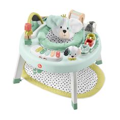 a baby's high chair with toys on it