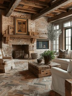 a living room filled with furniture and a fire place in the middle of a room