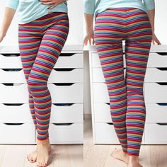 the woman is wearing colorful striped leggings and has her hands on her hips