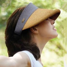 Wide round brim women's visor hat. High front band creates a hat look. Black long bow accent. Wide brim with 4.5" peak, protect face and ears. 2.25" wide band. Elastic comfort closure. UPF 50+ sun protection visor. One size. Straw Visor, Womens Visor, Long Bow, Visor Hat, Classic Hats, Quality Hats, Visor Hats, Hats For Sale, Wide Bands