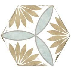 a white and blue tile design with leaves on it's sides, in the shape of a hexagonal pentagon