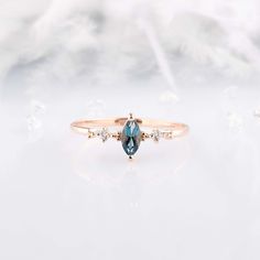 14k solid white gold minimalist art deco style marquise cut promise ring for her, Dainty & elegant gold white cz womens engagement ring WE OFFER UNLIMITED PERIOD INSTALLMENTS PLAN This is a beautiful, stunning, feminine ring that works well for all occasions, styles, and ages. You will love it! Ring information: Main stone: London blue topaz Approximate size: 6x3mm (1 stone) Accent stones: White cubic zirconia Approximate size: 1.5mm (2 stones) Approximate width of Band 1.1mm Front part: 7.1 Blue Topaz Promise Ring, London Blue Topaz Engagement Ring, Topaz Wedding Ring, Blue Topaz Engagement Ring, Promise Ring For Her, Topaz Engagement Ring, Fancy Gifts, Etsy Wedding Rings, Promise Rings For Her