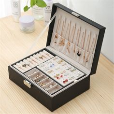 The luxurious jewellery display box will keep your items dust-free and in one convenient place. These jewellery boxes are perfect for rings, earrings, necklaces, bracelets and watches. The jewellery box also comes with a removable jewellery tray to allow for maximum storage. Each jewellery box has 8 hooks for your necklaces and a suede pocket to ensure they remain untarnished and tangle-free during storage. The Leather Jewellery Box also has a two tray structure to maximise storage. The top tray Velvet Jewelry, Jewelry Box, Velvet, Necklaces, Leather