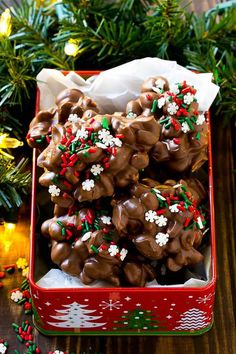 chocolate christmas cookies in a red box on a wooden table