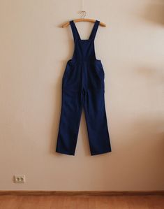 "Work Overall Blue Work Overalls Navy Blue Boys Jumpsuit Workwear Bib Overall Jumpsuit  Bib and Braces Dungarees Royal Blue Workers Salopette Industrial Clothing Work Romper Mechanic WorkWear Small Size Measurements (lying flat): Waist: 13.5\"/ 34 cm Overall length: 56\"/ 142 cm  Pant leg inseam: 28\"/ 71 cm Please check measurements to insure a proper fit. Remember to allow yourself some extra room for movement. You can compare these with something from your closet that fits you well. Condition: great Vintage Condition Material: cotton SHIPPING * I ship worldwide via Priority mail * Items are shipped 3 - 5 business days after receiving the payment. * I ship from Europe, so please allow 2 to 4 weeks for the package to arrive if you live overseas. * Europe 5 - 10 business days. 18" Blue Overalls For Streetwear, Blue Shortalls With Pockets, Blue Bib Front Denim Jumpsuit With Pockets, Blue Denim Bib Front Jumpsuit With Pockets, Blue Denim Jumpsuit With Bib Front And Pockets, Blue Overalls With Pockets, Fitted Shortalls With Pockets For Workwear, Fitted Overalls With Suspenders For Work, Blue Shortalls With Suspenders