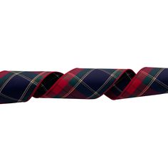 a red and black plaid tie on a white background in three different directions, with one being rolled up to the side